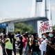 Protesters gather at Sidney Lanier Bridge in McGlynn, Ga., where Ahmaud Arbery loved to run.